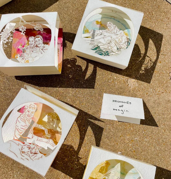 "moments of magic" cut paper shadowboxes with poem inscriptions